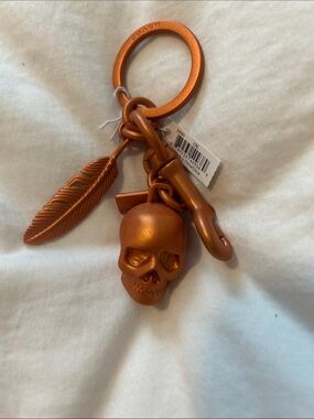 Coach rare Metallic Orange Feather Charm Key Ring
